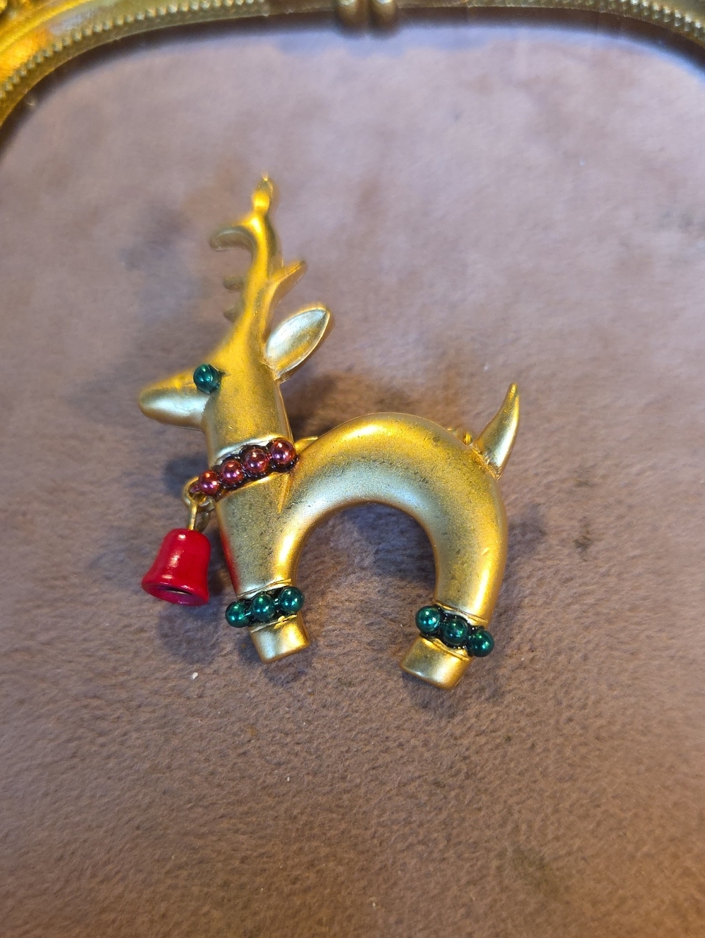 VintageGold Reindeer Holiday Brooch with Red Bell and Green Accents